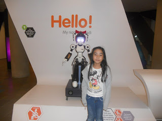 At the lobby of The Mind Museum with the talking robot Aedi