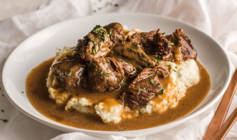 BEEF TIPS & GRAVY OVER CAULIFLOWER MASH