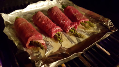 The Asparagus stuffed rouladen sizzling away on the bbq