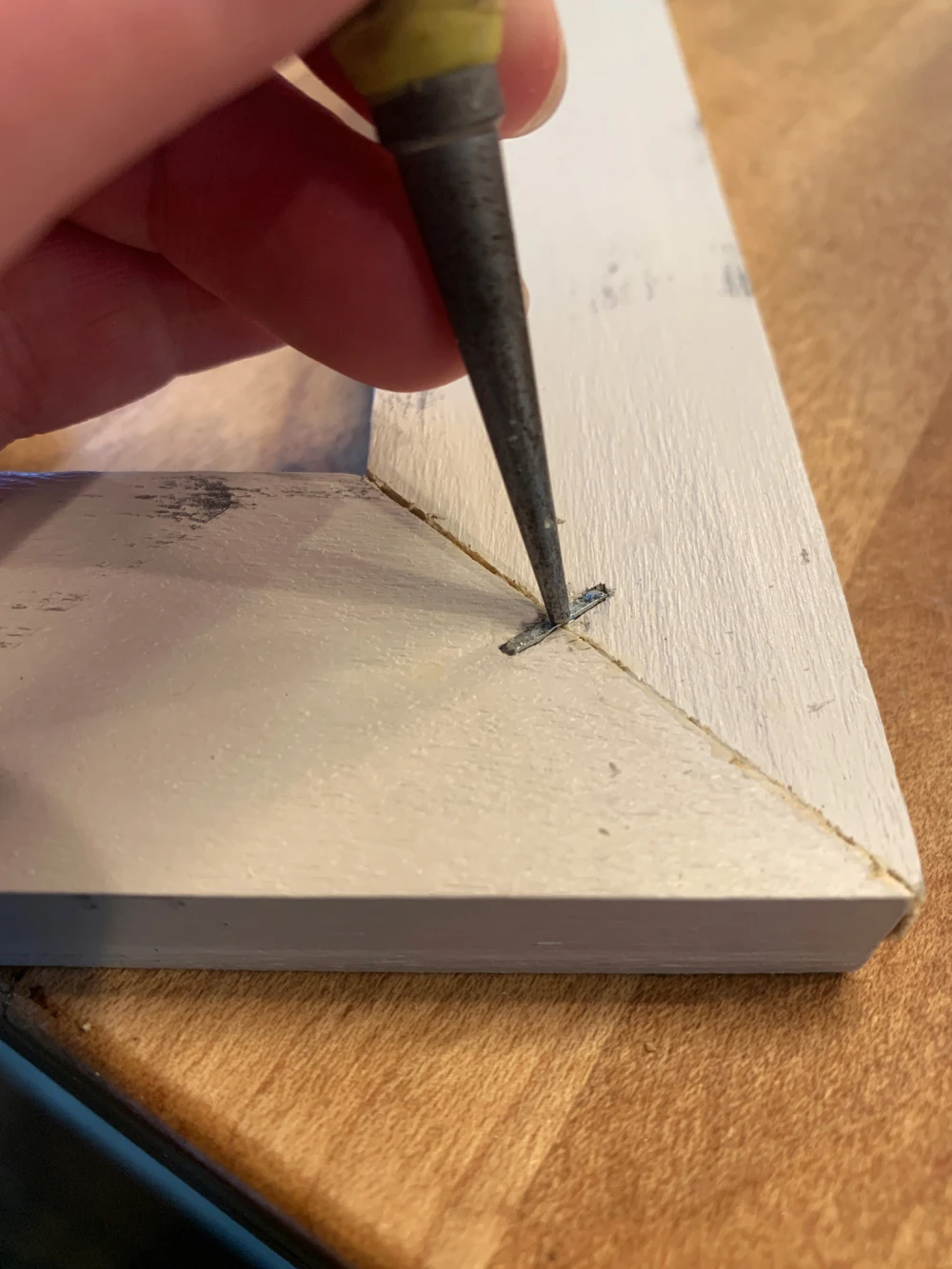 nail punch staple in wood