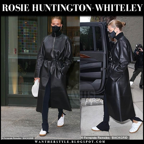 Rosie Huntington-Whiteley in black leather trench coat and white sneakers