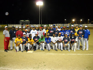 Me playing baseball out of the country. This was the group of guys that were with me and my team. Also this photo was taken on Andrew Jones's home field.