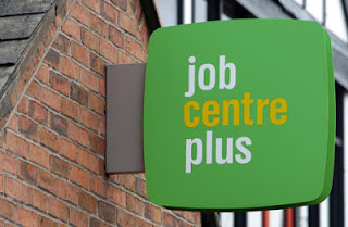 Job Centre Plus sign attached to the gable end of a building