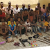 Lagos: Women arrested with guns as police parade 56 suspected cultists, armed robbers