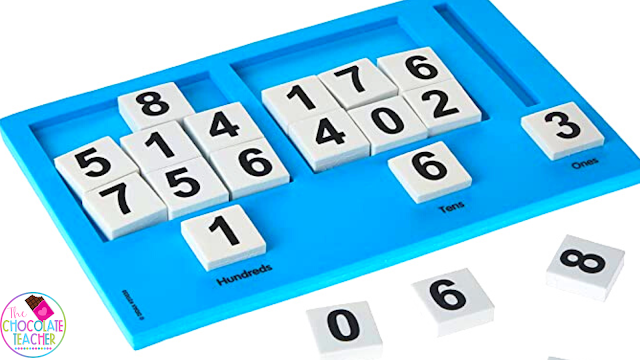 Using a place value mat like this makes learning feel more like a game for your students.