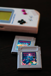 handheld game consoled with a Tetris game cartridge