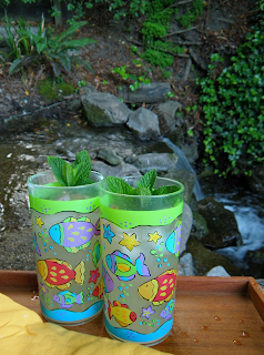 Two Glasses of Lemonade near Waterfall