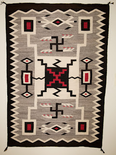 JB Moore Navajo rug with swastikas.