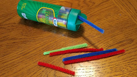 Pipe cleaners in a cheese container