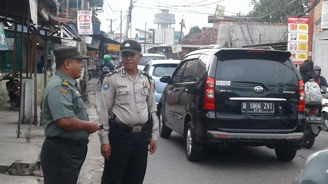 Sinergitas Terjalin, Babinsa dan Babinkamtibmas Beji Gatur Lalin Bersama