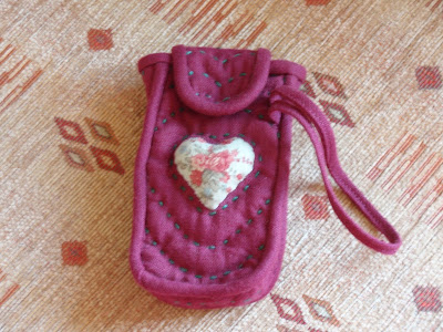 Applique Heart, and running stitch embroidered quilting...