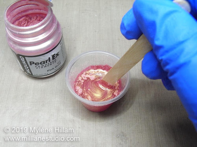 Stirring the Pearl Ex powder through the resin