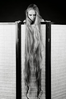 pretty girl with floor length hair blonde locks