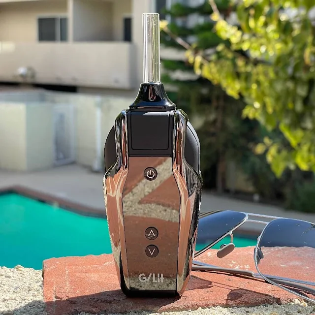Portable vaporizer and sunglasses at the pool.