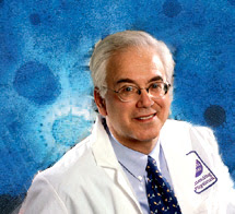 Martin J. Blaser, M.D shown with photo of sars (coronavirus) in background