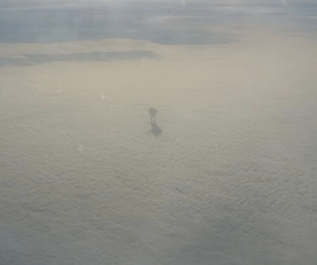 Nick O'Donoghue filmed in a plane out the window of a figurine on the clouds.