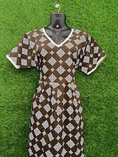 Three-quarter view of deep green cotton frock nighty with pattern design