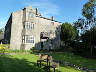 A photograph of Swarthmoor Hall on a sunny day.