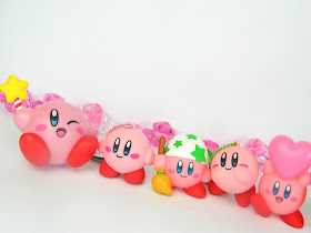 A row of Nintendo Kirby figures 