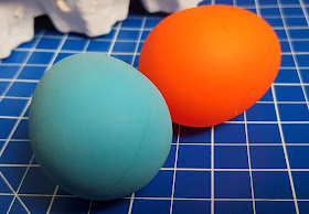 Blue and orange rubber eggs Crazy Eggz game