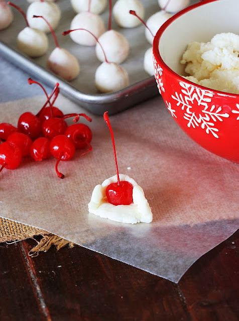 Wrapping Maraschino Cherry in Homemade Chocolate Covered Cherry Filling Dough Image