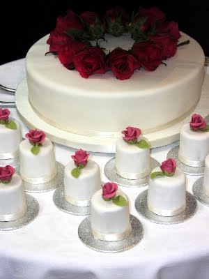white and red mini wedding cakes