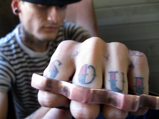 Gangster Fonts Tattoos- the right to wear such a tattoo is earned through difficult experiences of the past.66666666666