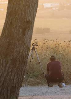 A photo of me taking the sunset photo below