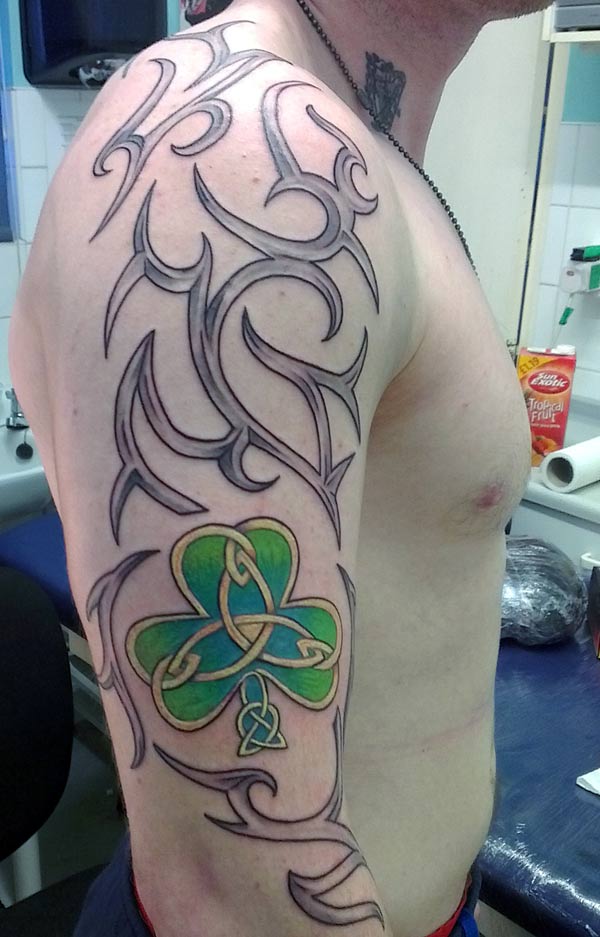 This tattoo design is beautiful ideas tribal tattoo with shamrock