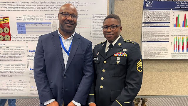 Army Staff Sgt. Luka Ndungu (right) and his research advisor, Dr. Bernard Okech. (Photo credit: Luka Ndungu)