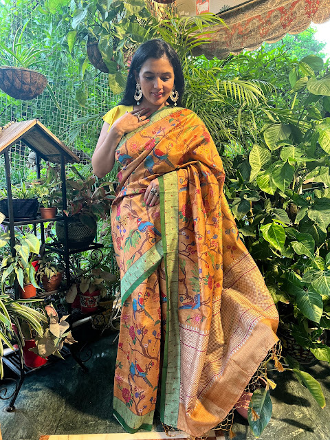 Gold Tussar saree with digital kota doria print.