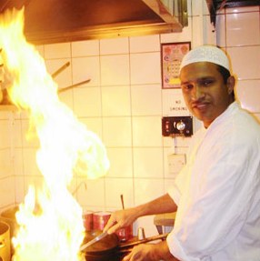 Man cooking in kitchen