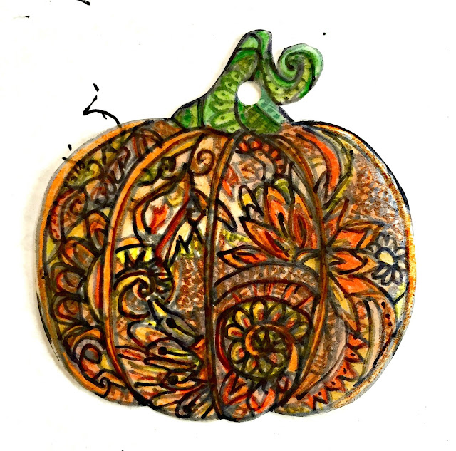 ShrinkyDink pumpkin before baking.