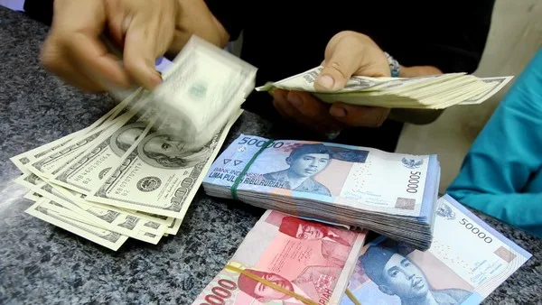 Rupiah Melempem, Dolar AS Naik ke Rp 14.103