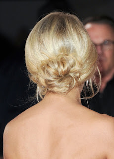 Carrie Underwood loose bun updo hairstyle at the American Country Awards