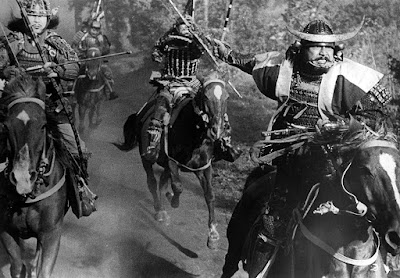 Toshirô Mifune and Akira Kubo charge into battle on horses in Akira Kurosawa's 1957 film "Throne of Blood."