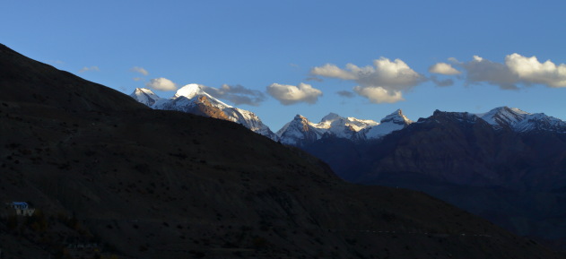 Sunset over the snow capped mountains at Dhankar, Spiti Valley