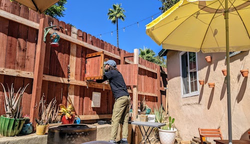 Taking orders from back patio