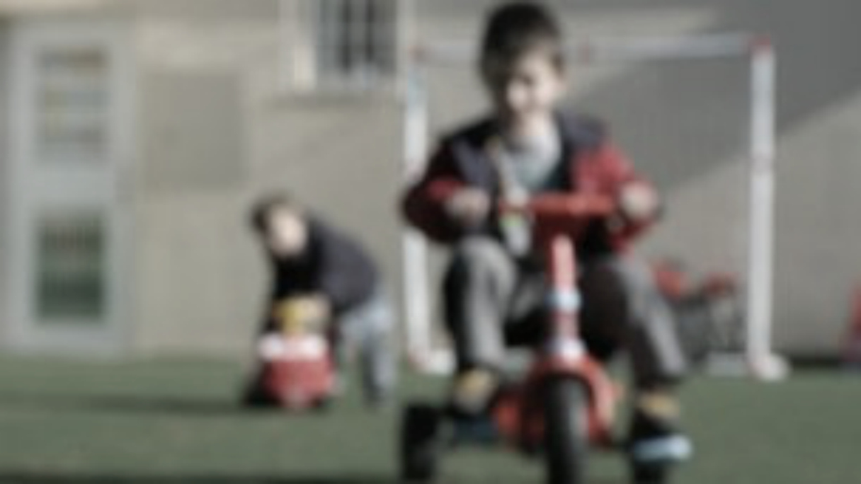 Children play at a centre in Greece caring for young people whose 
parents are unable to cope