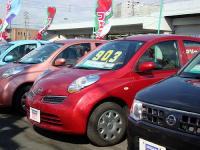 Cars for sale at a Japanese showroom