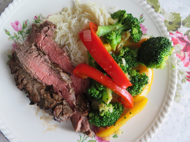 Marinated Flank Steak and pepper broccoli stir fry