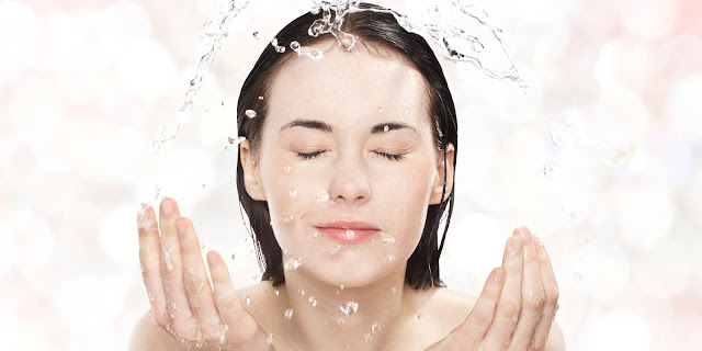 girl-washing-face-with-water-cleansing-skincare