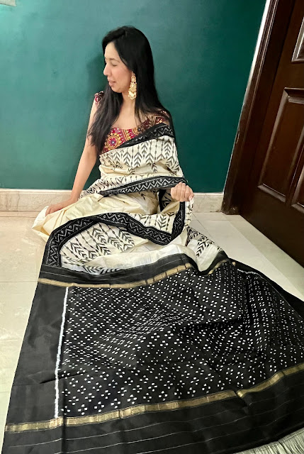 Minimal design black & white silk pochampally saree with ikat tree motifs