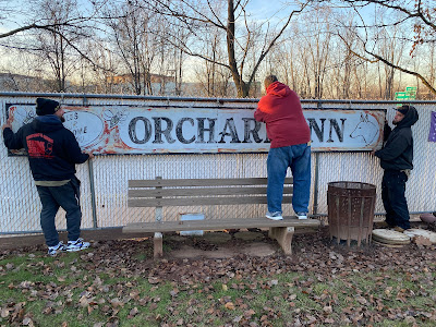 December 2022... Joey Lamberti removing the Orchard Inn sign from his fence and loading onto a truck... which will bring her back to where it all began! How fuckin' cool is that!