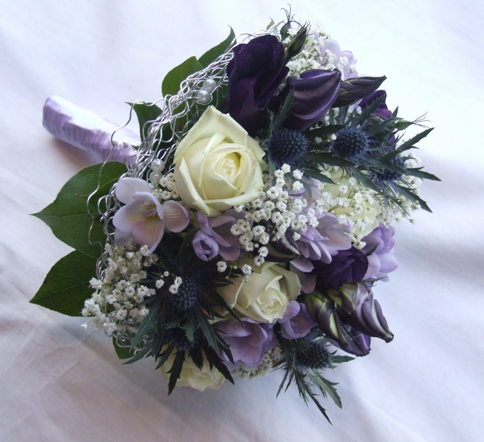 RJ's Florist: Purple, lilac and ivory wedding flowers