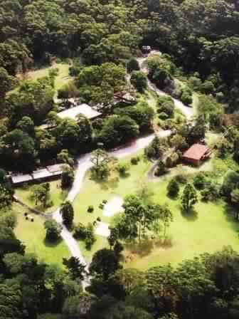 Aerial view of the lodges and meeting hall at Govinda Valley,Sydney