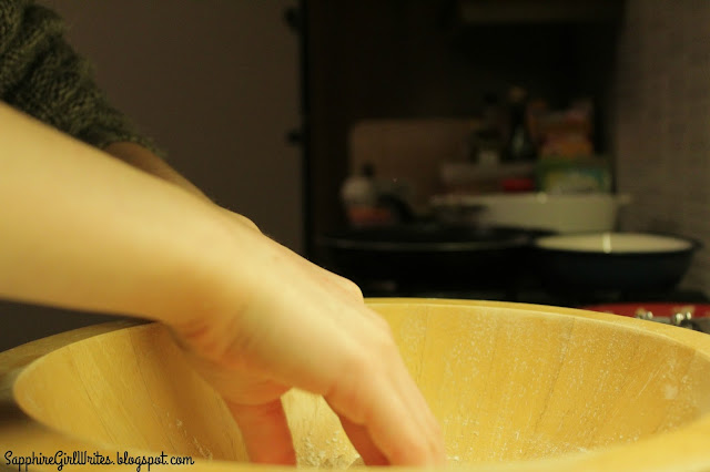 Hands in a bowl