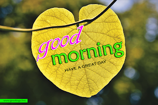 Creative greetings with good morning wishes on heart shaped yellow leaf