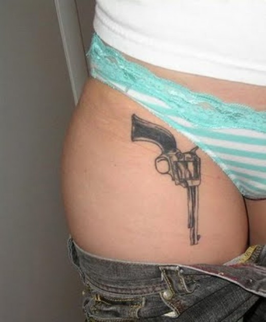 The seventh of my Gun Tattoos is yet another lil thigh tattoo so ladies if