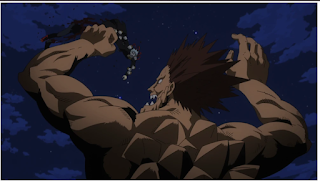 Shigaraki being thrown into the air by Gigantomachia, a huge stony monster with a spiked shell on his back.